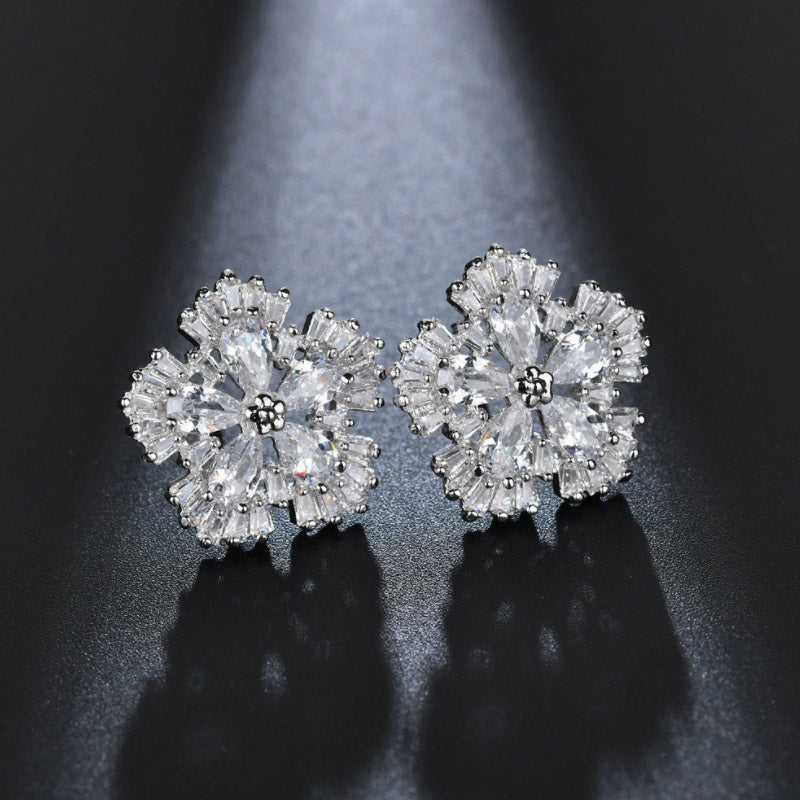 Flower inlaid ear studs